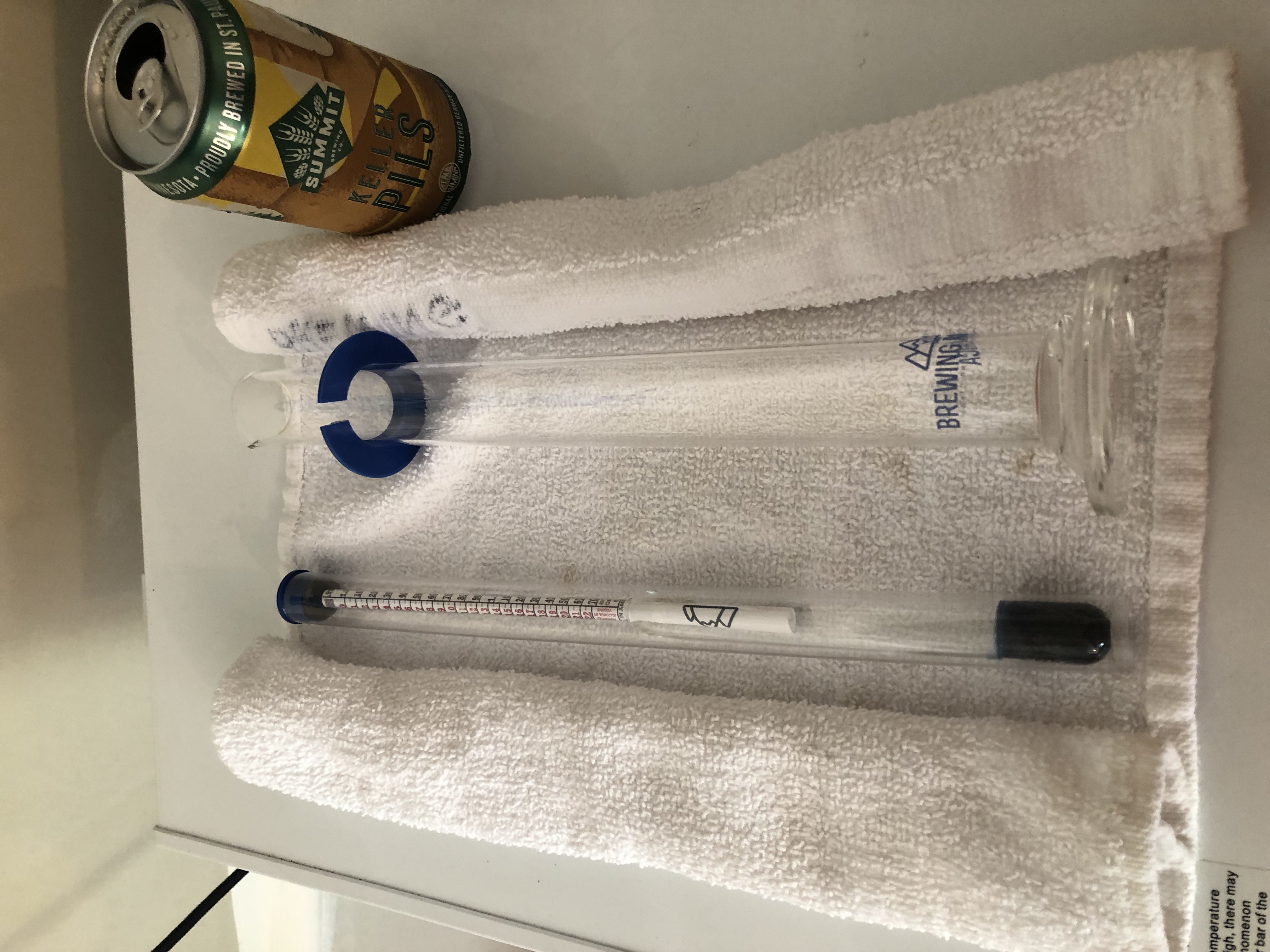 Hydrometer and smaple tube on a towel